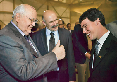 Mikhail Gorbachev (left) and his translator Pavel Palazhchenko (center), encourage Lafayette’s student government president, Matt Grandon ’12.