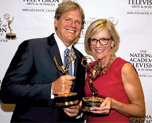 Christopher Naughton ’77 and producer Valerie Jones celebrate their win at the Mid-Atlantic Emmy ceremony.