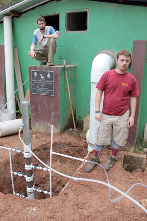 Mickey Adelman ’10 (left) testing innovative water-filtration technology in Marcala, Honduras. “Our direct applications are in the developing world, but good science in this area is important here in the United States as well.”