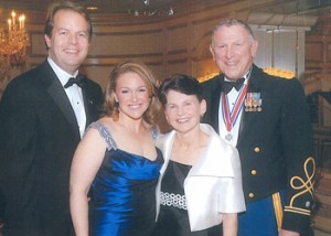 Duncan O’Dwyer ’60, wearing the New York Conspicuous Service Cross, which he received from Governor George Pataki, with his wife Alice, daughter Pam McGaan, and her husband, Andy McGaan.