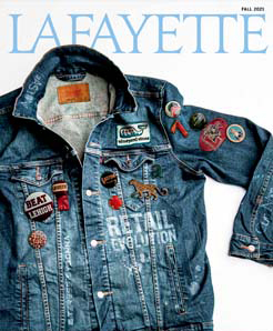 cover of fall 2021 magazine features jean jacket covered in various types of accessories/pins