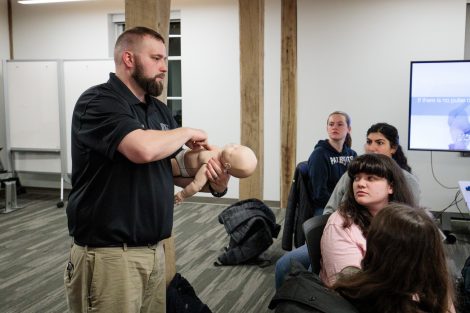 Student emergency medical technicians learn about CPR.