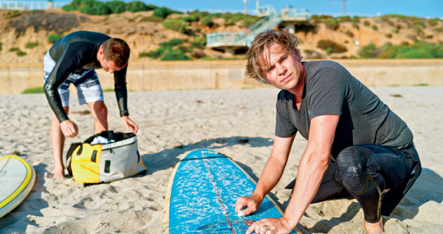 Former College roommates Eric McCue (left) and Chris Birchby get ready to ride the next wave.