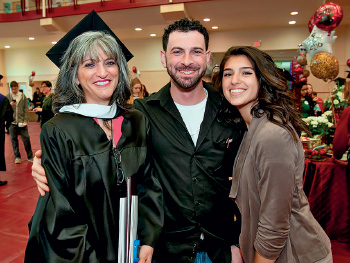  Nadda with her  son, Sean Nehmeh, and daughter, Jasmine Pavlinsky, at Commencement.